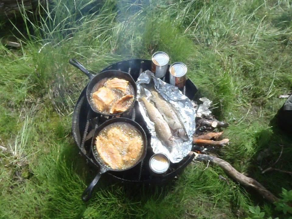 baked fish over an open fire